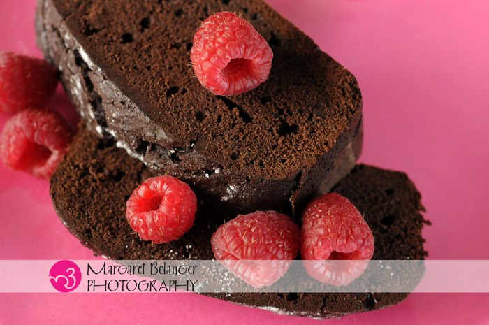 Chocolate cake slices with raspberries