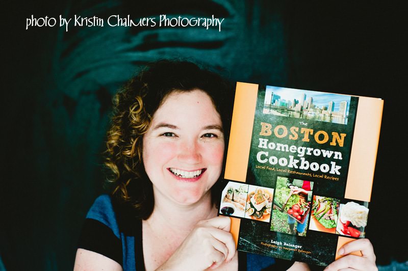 Boston Homegrown Cookbook photographer holding a copy of the book, Boston