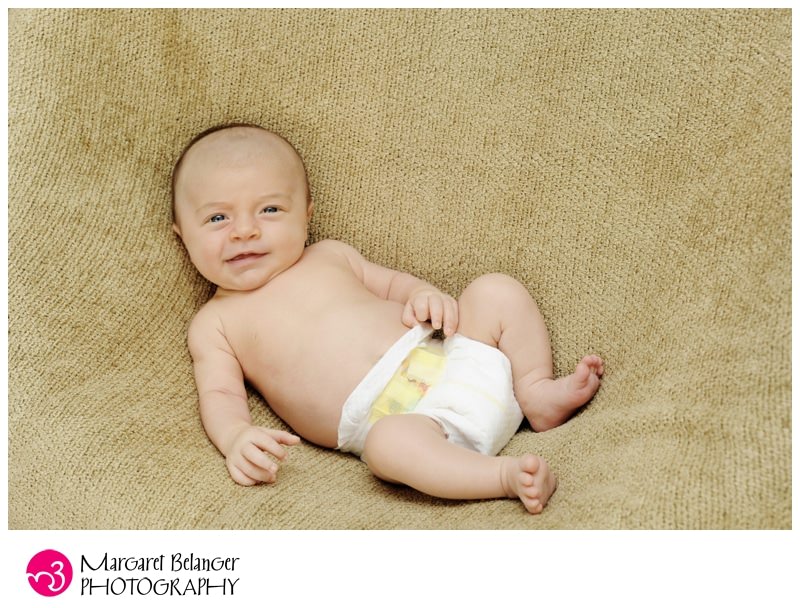 Full body photograph of a newborn baby boy