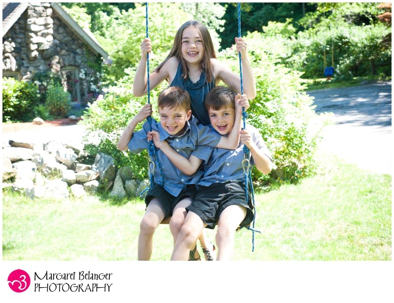 Siblings on swing, Winchester, MA