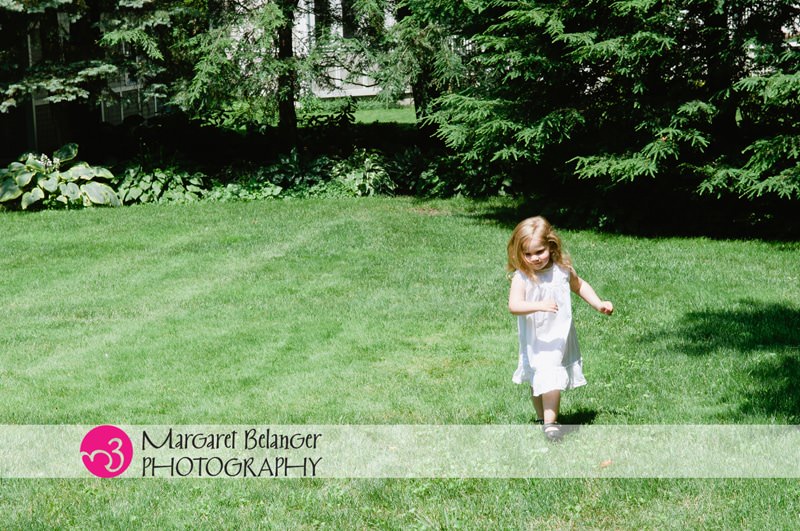 Little girl running in the grass, Winchester family portrait session