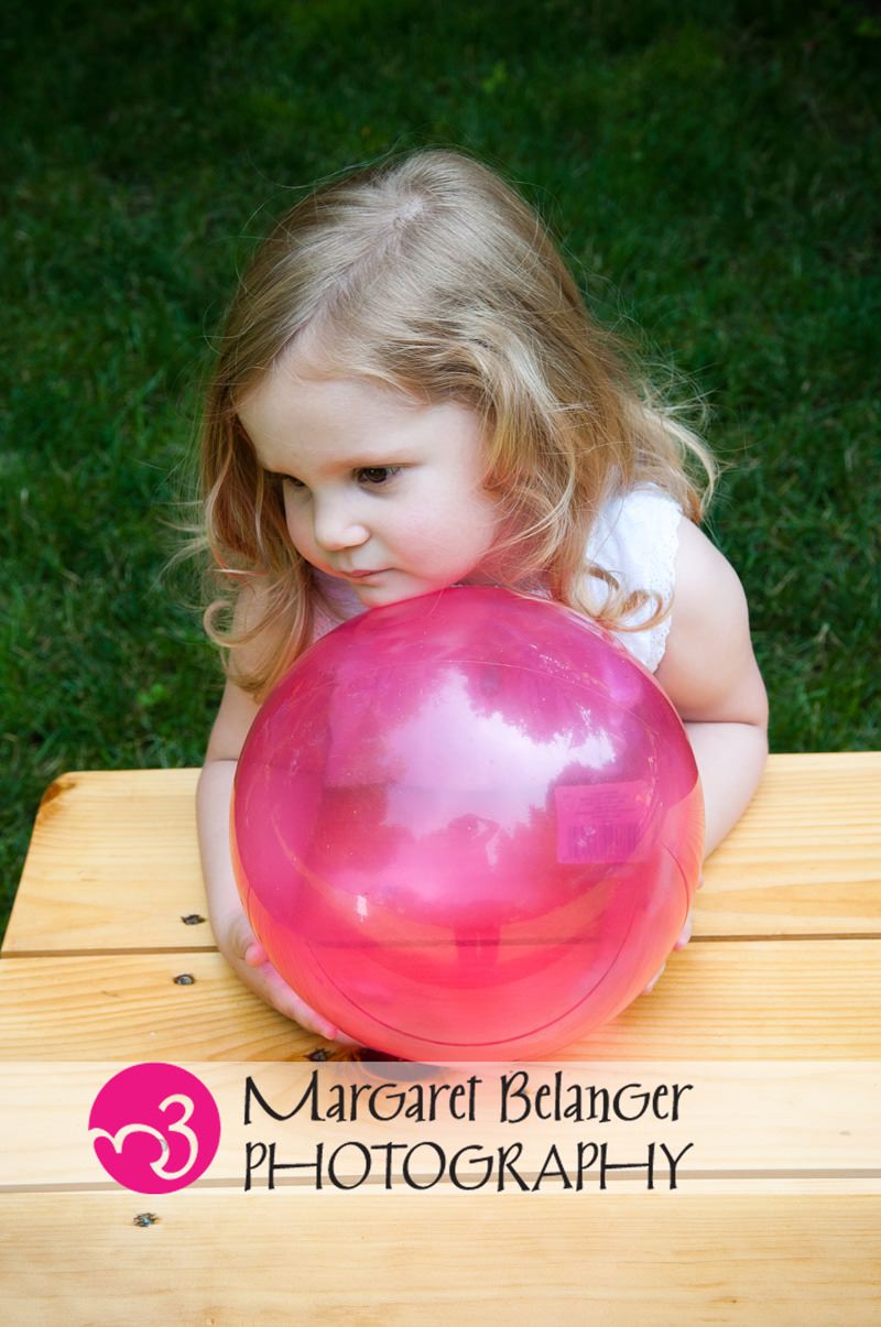 Little girl with a pink ball, Winchester, MA