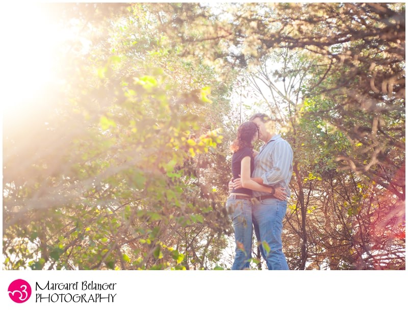 Couple in the trees, engagement photos at John Chafee engagement session