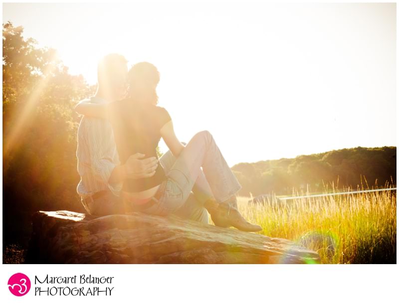 Couple on a rock, sun shining, John Chafee Nature Preserve