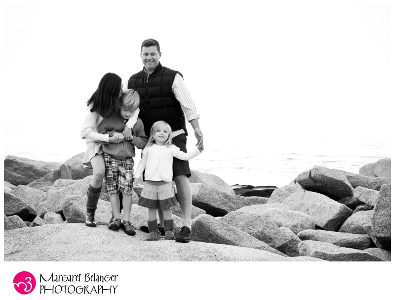 Candid black & white photo of a family at Halibut Point State Park, Rockport