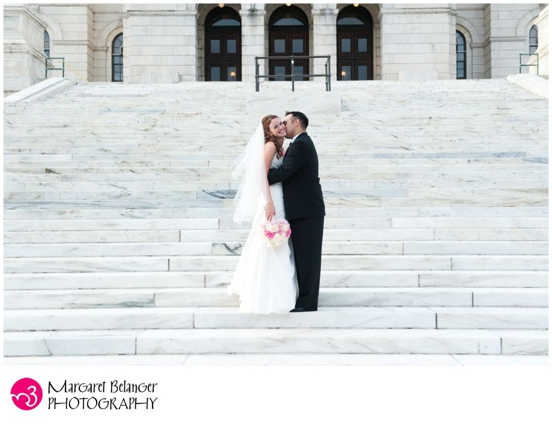 Bride and groom on the steps of the Rhode Island State House, Providence