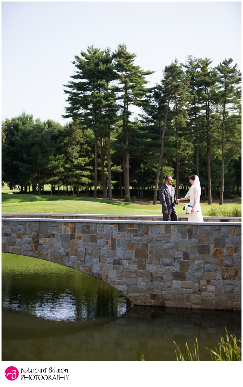 Bride and groom on bridge, Indian Pond Country Club