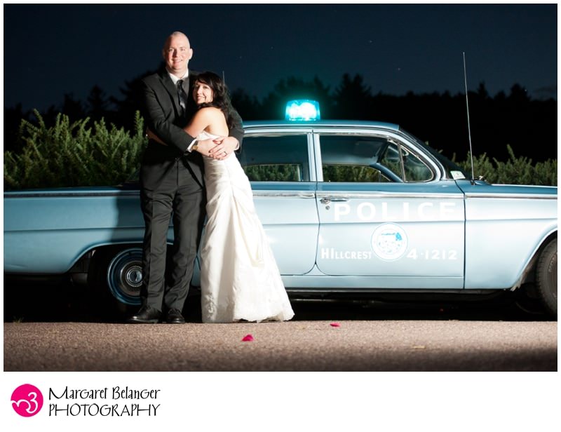 Bride and groom with vintage police car, Larz Anderson Auto Museum