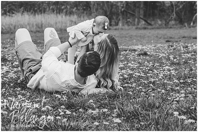 Cambridge family session, family photos lying down in the grass with dandelions