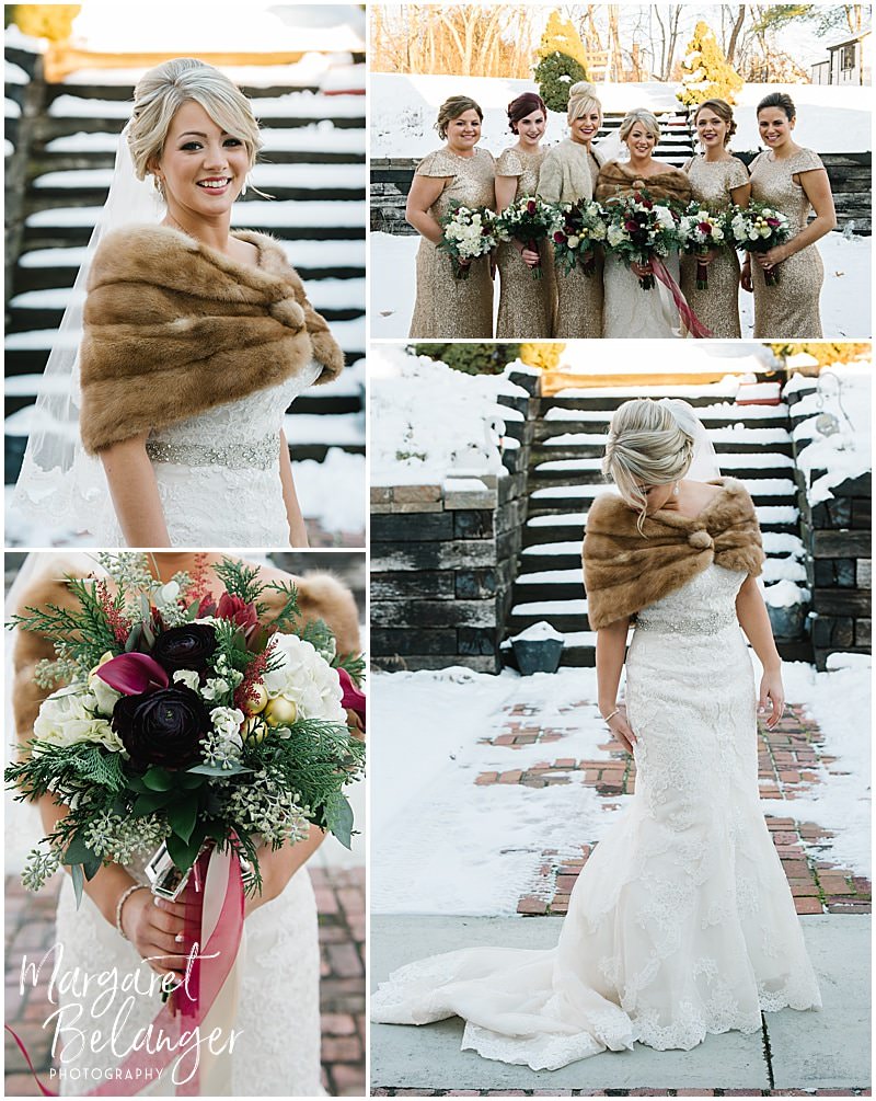 Bride in a fur stole poses for portraits outside in the snow