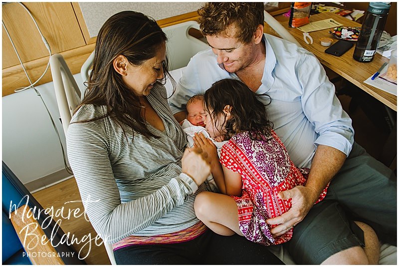 Brigham and Women's Hospital Fresh 48 newborn session - family of four snuggling together