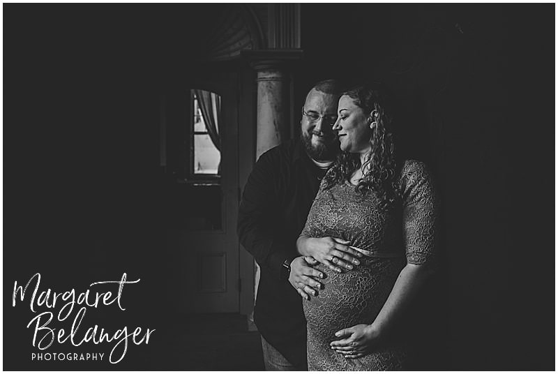 Mill No. 5 Lowell maternity session, moody photo of parents-to-be