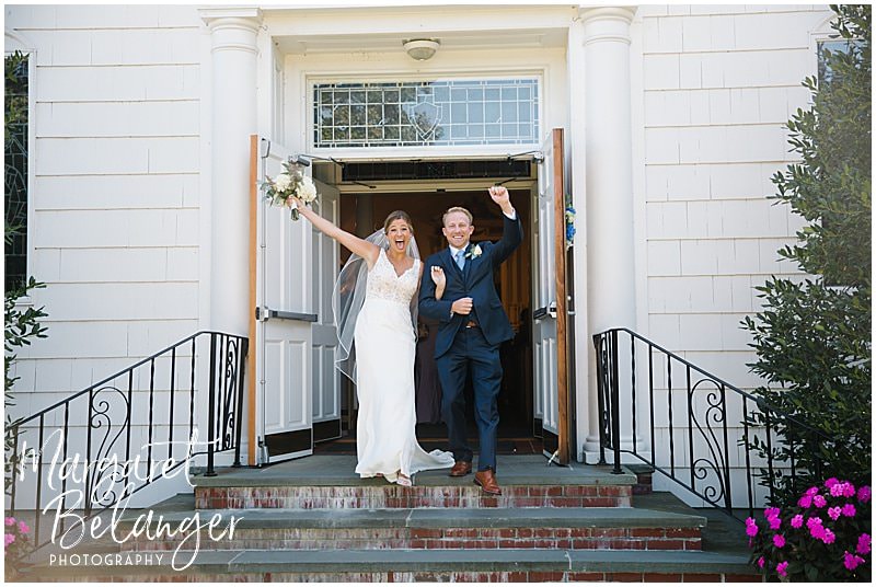 New Seabury Country Club wedding, bride and groom excitedly exit the church
