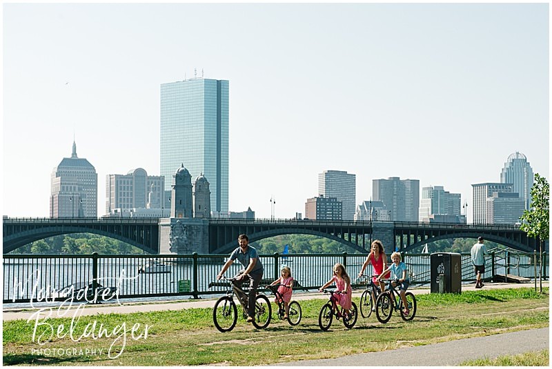 Family session along the Charles River in Cambridge, family riding bikes