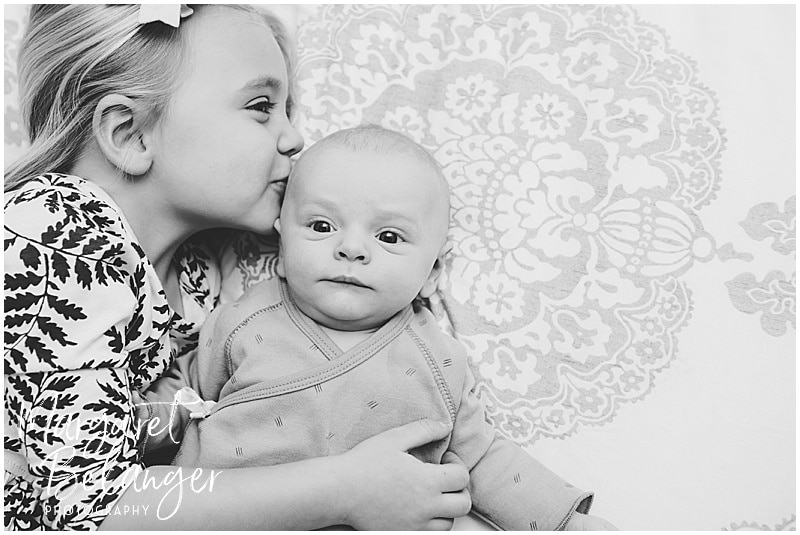 Charlestown newborn session, sister kissing baby brother