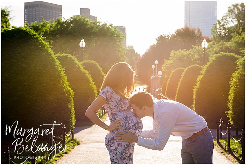 Sunrise Maternity session in the Boston Public Gardens, dad kissing mom's belly