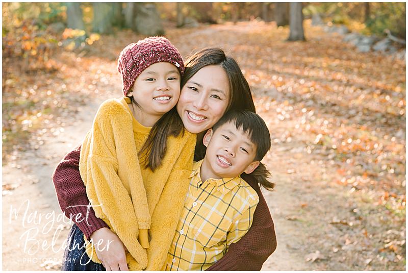 Fall Photo of a mother and her two children at Minute Man National Park
