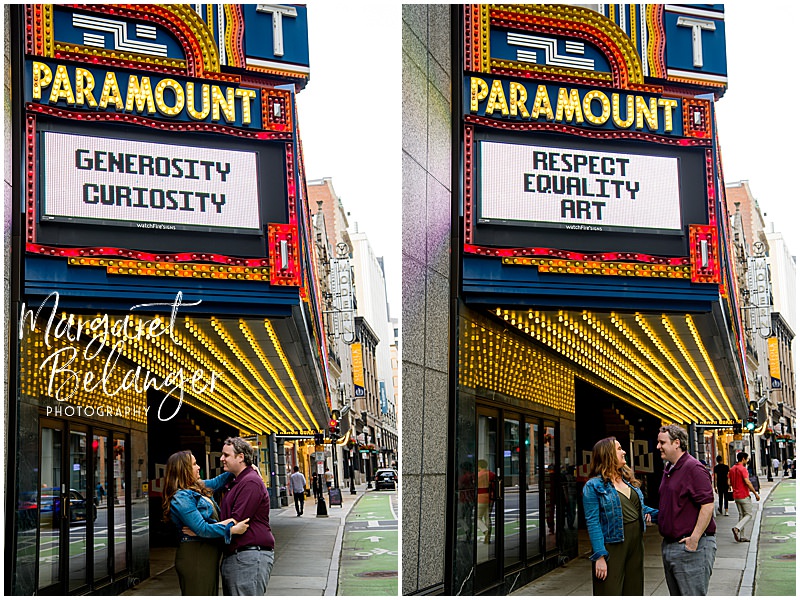 A couple poses under the Paramount Theater marquee in Boston's Theater District.