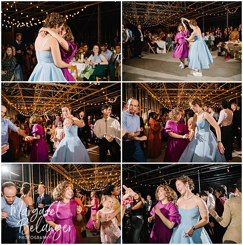 Brides dancing during their wedding reception in a greenhouse.