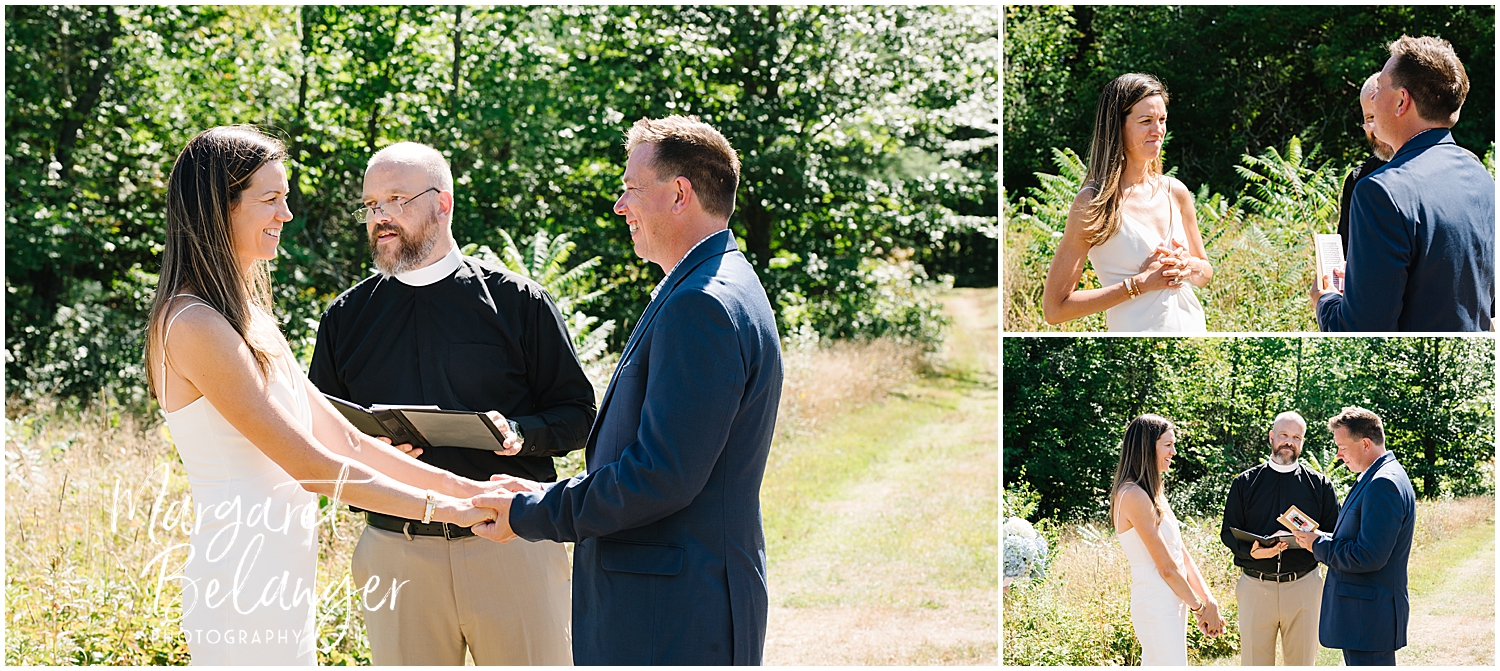 Outdoor wedding ceremony with a couple holding hands and an officiant reading from a book.