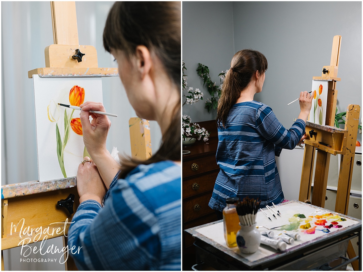 A woman painting flowers on a canvas in an art studio, using an easel and various painting tools. The artist is wearing a blue long-sleeve shirt.